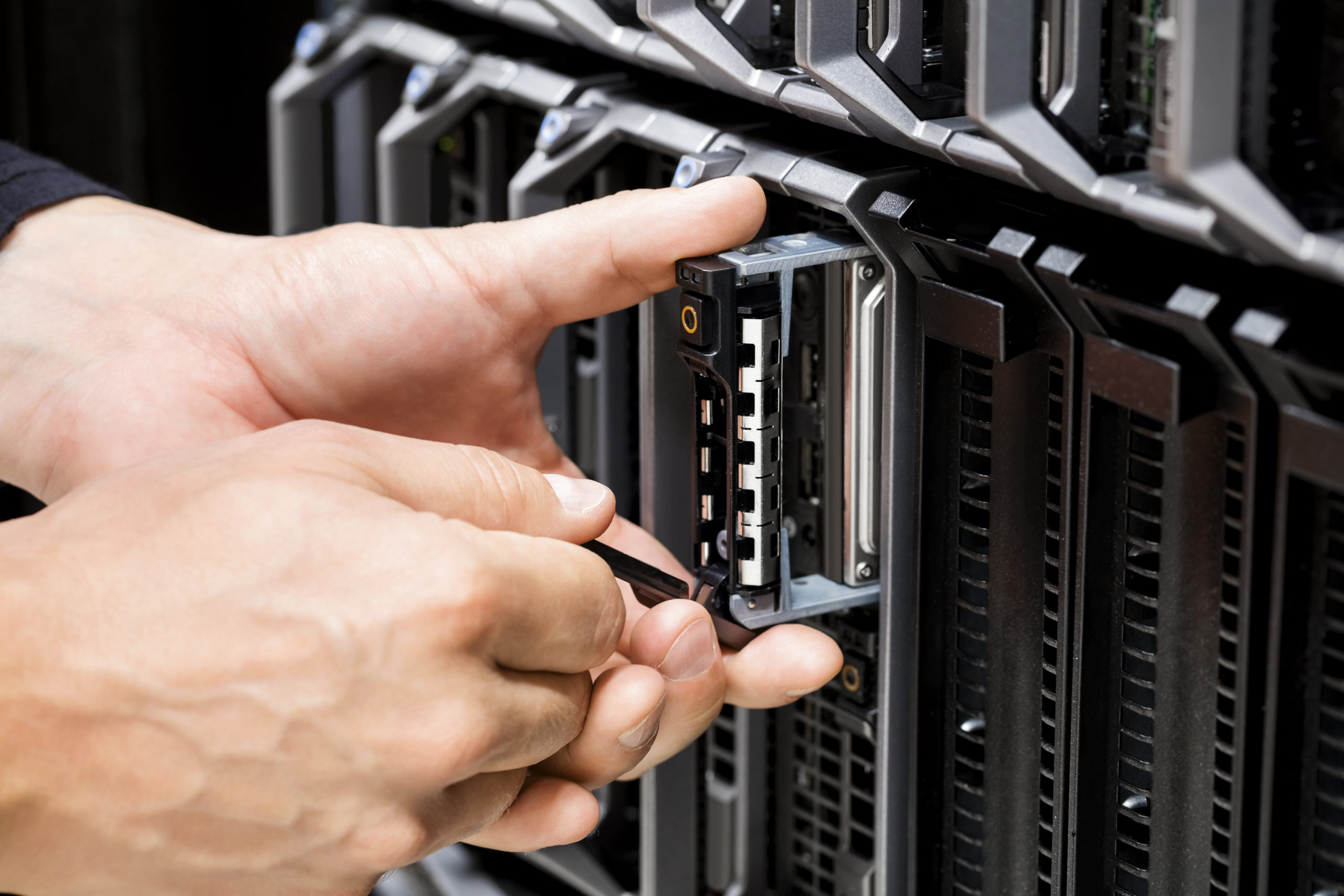 IT Technicians Hands Working On Server At Data Center
